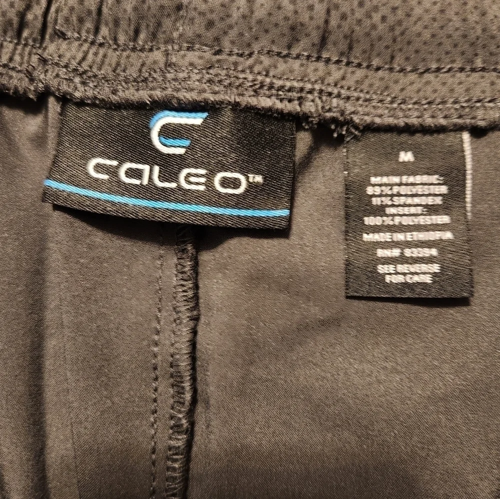 Caleo Men's active shorts size Medium with zip up pockets NWT graphite grey